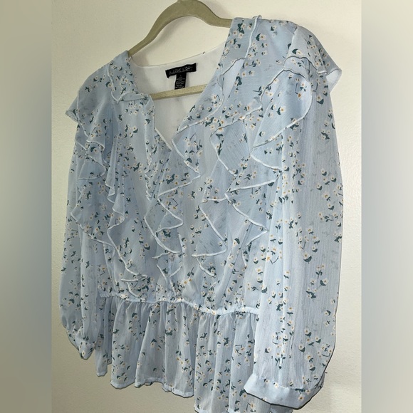 Blue floral ruffle top. 3/4 length sleeves. Brand is A love story. - Picture 2 of 4